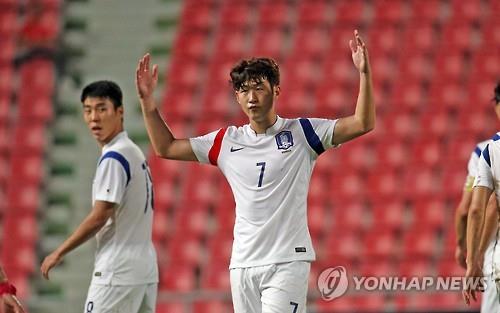 Son Heung-min of South Korea celebrates after scoring a goal against Myanmar in a World Cup qualifying match in Bangkok on June 16, 2015. (Yonhap)