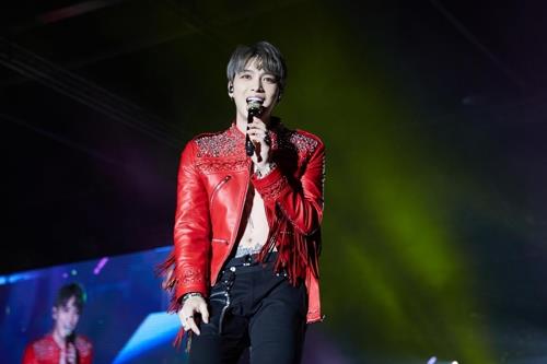 This undated photo provided by C-JeS Entertainment shows Kim Jae-joong performing. (Yonhap)
