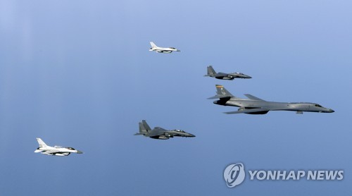 This photo, provided by South Korea's Air Force on March 22, 2017, shows a joint military drill staged by U.S. B-1B strategic bombers and South Korean KF-16 fighter jets. (Yonhap)