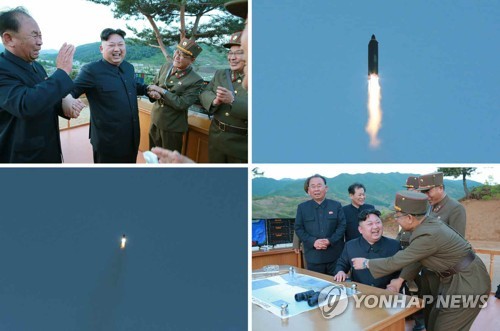This set of photos carried by North Korea's main newspaper Rodong Sinmun on May 15, 2017, shows North Korean leader Kim Jong-un observing the test-fire of a new mid-to-long-range ballistic missile, called the Hwasong-12. (For Use Only in the Republic of Korea. No Redistribution) (Yonhap)