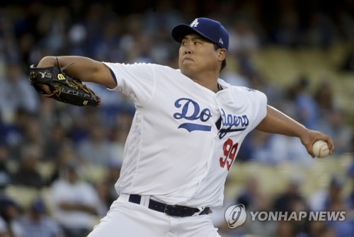 In this Associated Press photo, Ryu Hyun-jin of the Los Angeles Dodgers delivers a pitch against the Miami Marlins during their Major League Baseball regular season game at Dodger Stadium in Los Angeles on May 18, 2017. (Yonhap)