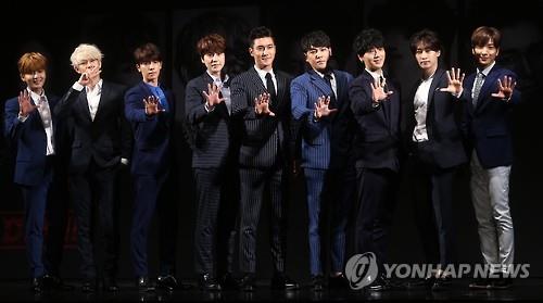 South Korean boy group Super Junior poses for a photo during a publicity event in Seoul on July 15, 2015, to promote their special album "Devil." (Yonhap) 