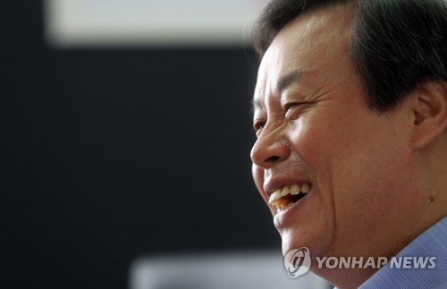 Do Jong-whan minister of culture sports and tourism smiles during an interview with Yonhap News Agency in Seoul on Aug. 4 2017