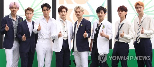 In this file photo, K-pop boy band EXO poses during a publicity event for its fourth album, "The War," at a hotel in Seoul on July 18, 2017. (Yonhap)