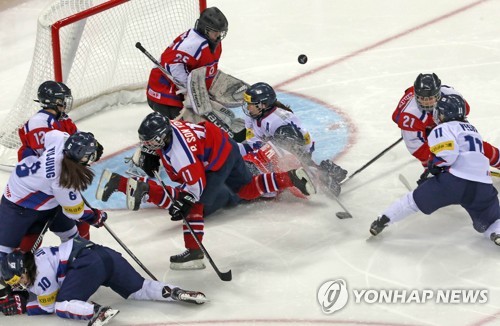 Koreas to form unified ice hockey team, march together in Winter Olympics Koreas to form unified ice hockey team, march together in Winter Olympics