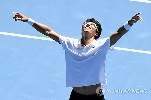 In this EPA photo taken Jan. 24, 2018, South Korean tennis player Chung Hyeon celebrates after defeating the United States' Tennys Sandgren in their quarterfinal match at the Australian Open in Melbourne, Australia. (Yonhap)