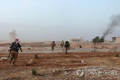 교전 중인 시리아 반군(AFP=연합뉴스)