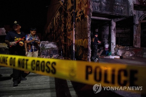 필리핀 경찰의 마약단속 현장[AFP=연합뉴스 자료사진]