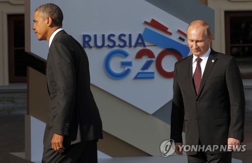 오바마 미 대통령(좌)과 푸틴 러시아 대통령