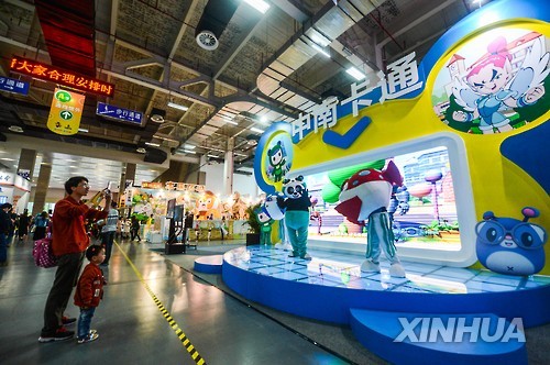 Visitors look at exhibits for the 2016 China International Cartoon and Animation Festival in this file photo from China's state-run news agency Xinhua. 